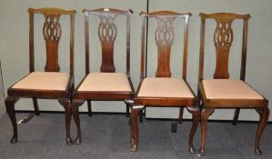 A set of eight mahogany dining chairs, including two carvers, 31cm wide, with upholstered seats,