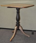 A 19th century mahogany tilt top table, raised on tripod base,