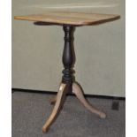 A 19th century mahogany tilt top table, raised on tripod base,