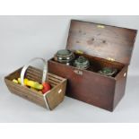 A vintage lidded wooden storage box, 45cm wide, containing three glass jars,