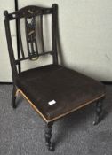 A mahogany side chair, inlaid with musical theme,