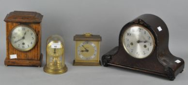 A group of four mantel clocks, including two wooden cased examples,