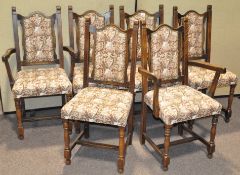 A set of six upholstered dining chairs, including two carvers,