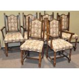 A set of six upholstered dining chairs, including two carvers,