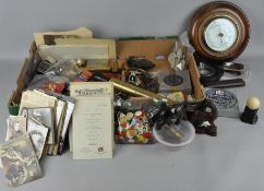 A large group of collectables, including photographs,