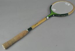 A novelty Jaguar Equipe badminton racket mirror,