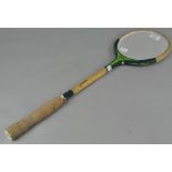 A novelty Jaguar Equipe badminton racket mirror,