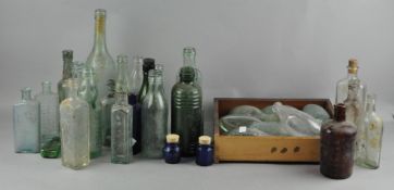 A collection of vintage glass bottles, including Boots the Chemist example,