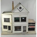 A vintage two storey dolls house,