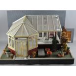 A dolls house conservatory, 58cm wide,