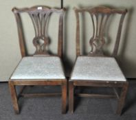 A pair of late 19th century dining chairs with squared legs,