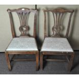 A pair of late 19th century dining chairs with squared legs,