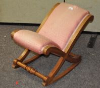 A vintage upholstered gout stool,