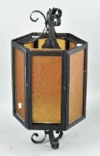 A vintage glass and metal hanging lamp,