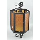 A vintage glass and metal hanging lamp,