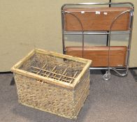 A folding tea trolley together with a wicker wine bottle crate