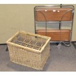 A folding tea trolley together with a wicker wine bottle crate