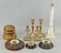 A group of collectables, including two pairs of brass candlesticks,