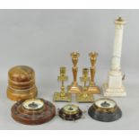 A group of collectables, including two pairs of brass candlesticks,