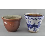 Two plant pots, one blue and white,