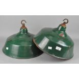 A pair of industrial enamel ceiling lights, outer colour green, inside white,