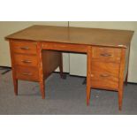 A mid century twin pedestal desk,