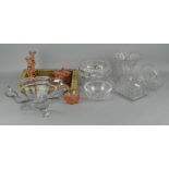 A collection of vintage glassware, including a pair of candlesticks, bowls and other items,