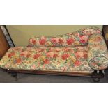 A mahogany chaise longue/day bed with floral upholstery,