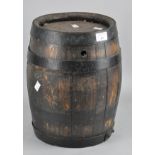 A small coopered wooden barrel,