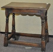 An early 20th stained wood side table,