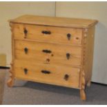 A vintage pine chest of drawers, with three long drawers,