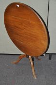 A late 19th/early 20th century tilt top table, of circular form, on tripod base,