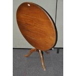 A late 19th/early 20th century tilt top table, of circular form, on tripod base,