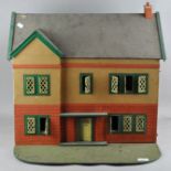 A Victorian two storey dolls house with garden,