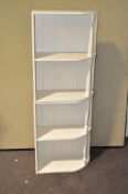 A pair of 20th century white painted corner wall units,