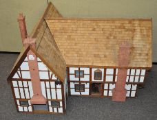 An unusually large mock Tudor dolls farmhouse,