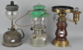 A group of three lamps, including a Major No 256 lantern,