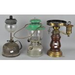 A group of three lamps, including a Major No 256 lantern,