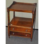 An early 20th century mahogany coffee table with two drawers to front,