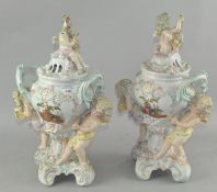 A pair of ornate lidded vases, in the Meissen style, both with twin handles, (one A/F),