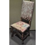 A 17th century style oak framed high back dining chair,
