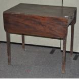 A late 19th century mahogany drop leaf table,