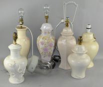 A group of six ceramic table lamps; together with a wall light,