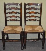 A pair of 18th century style rail back chairs