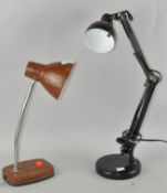 An anglepoise style lamp, together with another similar,