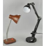 An anglepoise style lamp, together with another similar,