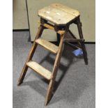 A metamorphic folding stool/step ladder,