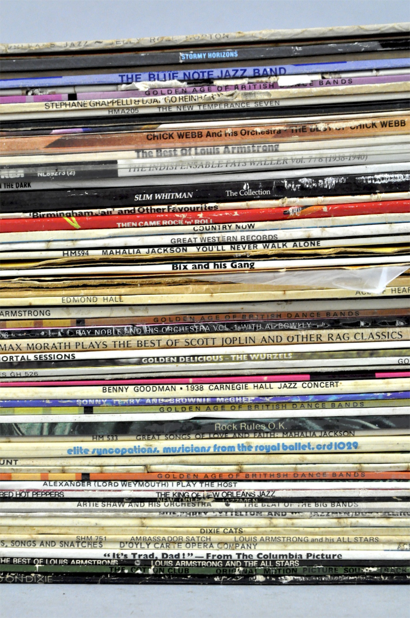 A collection of vinyl LP's including rock and jazz.