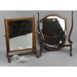 A mahogany shield shaped mirror,