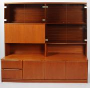 A teak 1970's modular shelving unit and sideboard, of rectangular section,